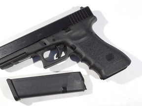 Glock pistol with a 17 round magazine is seen on December 18, 2012 . The gun is the same type that was used during a massacre at an elementary school in Newtown, Connecticut. (Joe Raedle/Getty Images)