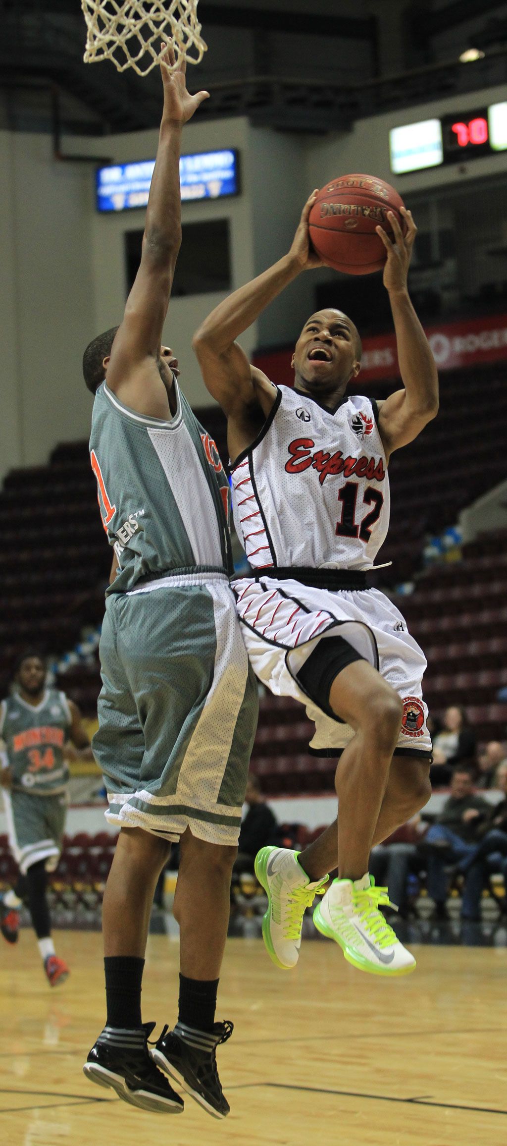 Windsor Express guard Darren Duncan, right, shoots past Moncton's Mikhail Torrance during the NBL of Canada game at the WFCU Centre Friday. (JASON KRYK/The Windsor Star) 
