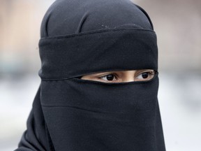In this file photo, a sharply divided Supreme Court of Canada was not able to definitively rule whether a woman can wear a religious veil known as a niqab while testifying in court. THE CANADIAN PRESS/AP Photo/Maya Alleruzzo