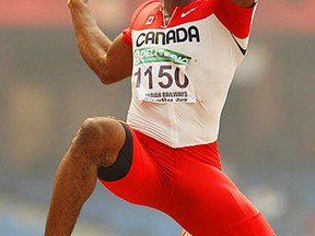 Jamie Adjetey-Nelson of Windsor competes in the men's long jump during the men's decathlon at the Delhi 2010 Commonwealth Games in Delhi, India.  (Photo by Michael Steele/Getty Images)