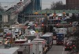 Truck traffic is backed up on Huron Church Road, pictured here looking north from Girardot Avenue, Monday, Dec. 10, 2012.(DAX MELMER/The Windsor Star)