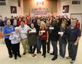 The Canadian Auto Workers union local 200 donated a total of $30,000 to six local charitable organizations Monday, Dec. 17, 2012, in Windsor, Ont. Posing with the cheques, from left, are Dan Cassady, CAW financial secretary, Eileen Clifford, Essex Food Bank, Ron Dunn, Downtown Mission, Jennifer Cline, Well-Come Centre, Chris Taylor, CAW local 200 president, June Muir and Mike Turnbull, Unemployed Help Centre, Timothy McAllister, Amherstburg Food and Fellowship Mission, Cathy Masse, Lakeshore Community Food Bank and Marc Renaud, CAW local 200 vice-president. (DAN JANISSE/The Windsor Star)