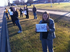 High school students protest in front of OSSTF office on Lauzon Parkway. They say they are pawns in this process. (Dan Janisse/The Windsor Star)