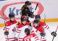 Canada captain Ryan Nugent-Hopkins, centre, celebrates his goal with teammates while playing against Germany during first period IIHF World Junior Championships hockey action in Ufa, Russia on Wednesday, Dec. 26, 2012. (THE CANADIAN PRESS/Nathan Denette)