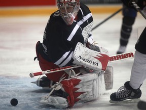 Goaltender Jimmy Howard watches as the puck trickles into the net during the first period of the Rock out the Lockout Charity game at the WFCU Centre, Saturday, Dec. 8, 2012.  (DAX MELMER/The Windsor Star)
