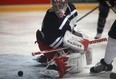 Goaltender Jimmy Howard watches as the puck trickles into the net during the first period of the Rock out the Lockout Charity game at the WFCU Centre, Saturday, Dec. 8, 2012.  (DAX MELMER/The Windsor Star)