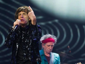Mick Jagger, left, and Keith Richards of The Rolling Stones perform in concert on Saturday, Dec. 8, 2012 in New York. (Photo by Charles Sykes/Invision/AP)