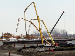 Workers on the Herb Gray Parkway undertake an extensive concrete pour. (NICK BRANCACCIO/The Windsor Star)