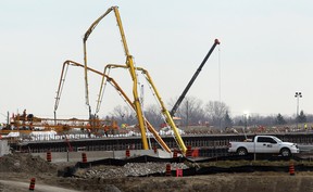 Workers on the Herb Gray Parkway undertake an extensive concrete pour. (NICK BRANCACCIO/The Windsor Star)