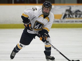 Windsor's Jenny MacKnight brings the puck up the ice against the York Lions at South Windsor Arena. (DAX MELMER/The Windsor Star)