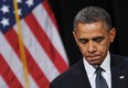 .U.S. President Barack Obama pauses as he speaks during a memorial service for the victims and relatives of the Sandy Hook Elementary School shooting on December 16, 2012 in Newtown, Connecticut. Twenty-six people were killed when a gunman entered Sandy Hook Elementary and began a shooting spree. MANDEL NGAN/AFP/Getty Images