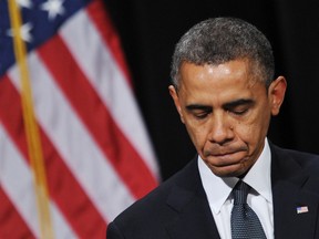 .U.S. President Barack Obama pauses as he speaks during a memorial service for the victims and relatives of the Sandy Hook Elementary School shooting on December 16, 2012 in Newtown, Connecticut. Twenty-six people were killed when a gunman entered Sandy Hook Elementary and began a shooting spree. MANDEL NGAN/AFP/Getty Images