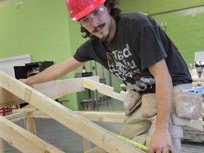 Aaron George is a carpenter who is completing his apprenticeship through St. Clair College. (DAN JANISSE/The Windsor Star)