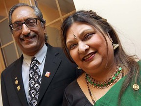 Aruna Koushik, right, show here with her husband Shiva, was recognized as a Community Champion by University of Windsor MBA students Dec. 7. 2012.  (TYLER BROWNBRIDGE  / The Windsor Star)