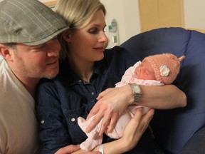 Leanne and Joe Tedesco hold their newborn baby Lia at Windsor Regional Hospital on December 18, 2012 in Windsor, Ontario.  See story on baby names by Ted Whipp. (JASON KRYK/ The Windsor Star)