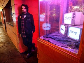 Stephen Hargreaves waits in the doorway at the Phog Lounge in Windsor in this file photo. Phog Lounge will be open for its eigth consecutive Christmas evening.  (Tyler Brownbridge / The Windsor Star)