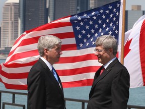 In this file photo, Michigan Gov. Rick Snyder and Prime Minister Stephen Harper cleared the way for a new Windsor-Detroit bridge in June 2012. (Windsor Star / DAN JANISSE)