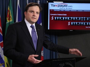 The Canadian Taxpayers Federation federal director Gregory Thomas speaks at a press conference on Parliament Hill in Ottawa on Friday, November 23, 2012. The Canadian Taxpayers Federation announced that Canada's Federal Debt will cross the $600 billion mark tomorrow. THE CANADIAN PRESS/ Patrick Doyle