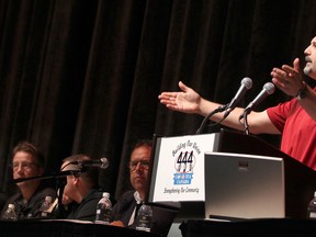 CAW Local 444 president Dino Chiodo, right, speaks to Chrysler workers at the Colosseum at Caesars Windsor as they vote to ratify a contract with Chrysler, Sunday, Sept. 30, 2012.  (Photo: DAX MELMER/The Windsor Star)