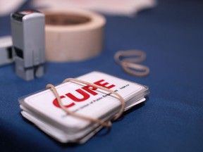File photo of a CUPE card..  (DAX MELMER/The Windsor Star)