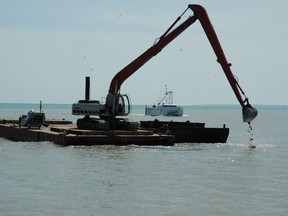 Dredging the mouth of Wheatley Harbour in 2006.(Windsor Star files)