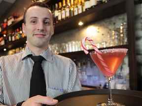 Jordan Sementilli displays a holiday-themed drink at Toscana Restaurant and Wine Bar, in Windsor. (DAN JANISSE / The Windsor Star)
