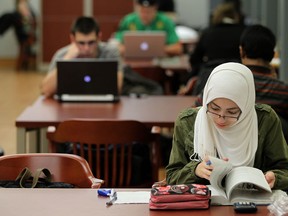University of Windsor students study in the CAW Student Centre, Monday, Dec. 3, 2012.  (DAX MELMER/The Windsor Star)