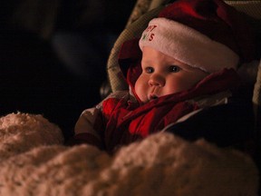 Zachary Buchanan watches his first Windsor Santa Claus Parade on Riverside Drive Saturday, December 1, 2012.        (KRISTIE PEARCE / The Windsor Star)