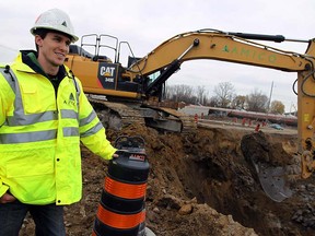 Civil engineer Jonathan Osborne is working for Amico Infrastructure on the Herb Gray Parkway construction.                  (TYLER BROWNBRIDGE / The Windsor Star)