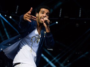 Toronto rapper Drake performs at the "Made In America" music festival on Sunday, Sept. 2, 2012, in Philadelphia. (THE CANADIAN PRESS/AP-Charles Sykes )