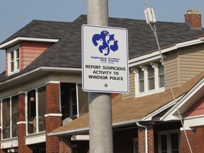 A Neighbourhood Watch Windsor sign is displayed on Hall Avenue in Windsor.  (JASON KRYK/ The Windsor Star)