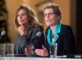 Ontario Liberal party leadership candidate Sandra Pupatello (left) listens as Kathleen Wynne speaks during a forum at Canadian Club of Toronto in Toronto on Thursday December 6, 2012. THE CANADIAN PRESS/Frank Gunn