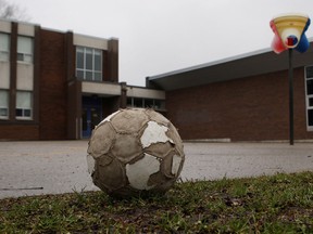 The Romeo Public School yard is empty as teachers from the Stratford area participate in a walkout on, December 10, 2012. (THE CANADIAN PRESS/Dave Chidley )