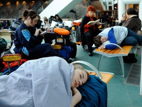 Airline travel can be frustrating at the best of times, particularly when there are flight delays. Be ready for such times with your own travel survival pack. (MARK VAN MANEN / Postmedia News files)