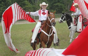 The Canadian Cowgirls perform as an opening act before the RCMP Musical Ride performance at the Windsor Essex Therapeutic Riding Association, Sunday, Sept. 2, 2012.  (DAX MELMER/The Windsor Star)