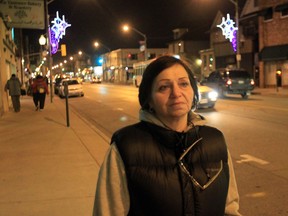Angela Ibrahim walks along Wyandotte Street east near the area where an armed robbery attempt had taken place.  See story by Chris Thompson and quote by Ibrahim. (JASON KRYK/ The Windsor Star)