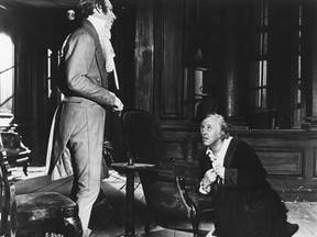 Ebenezer Scrooge (Alastair Sim) cowers from the spirit of Jacob Marley (Michael Hordern) in a scene from the 1951 movie A Christmas Carol. Now Theatre Windsor takes it a step farther with The Trial of Ebenezer Scrooge, being performed tonight through Sunday.