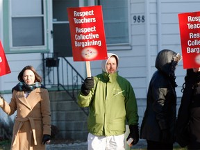 Elementary school teachers protest outside David Suzuki Public School in Windsor, Ont. on Dec. 12, 2012. (Nick Brancaccio / The Windsor Star)