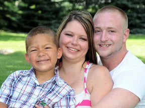 David Thomas' family: stepson Taveres Singleton, left, his girlfriend Joleen Heydon and David Thomas.(Photo courtesy of the Thomas family)