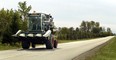 File photo of a farmer driving a combine in Essex County. (Windsor Star files)