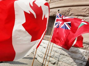 The Canadian and Ontario flags at Queen's Park, Toronto, Ont. (Postmedia News files)