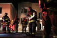 Windsor Fire and Rescue put out a fire in a fourplex apartment building on the 300 block of Chilver Avenue, Friday, Jan. 18, 2013.  One person was taken to hospital and one dog died.  (DAX MELMER / The Windsor Star)