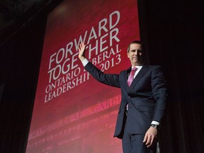 Premier Dalton McGuinty waves to the crowed while leaving the stage after speaking at the Ontario Liberal Leadership convention in Toronto on Friday, January 25, 2013. THE CANADIAN PRESS/Nathan Denette