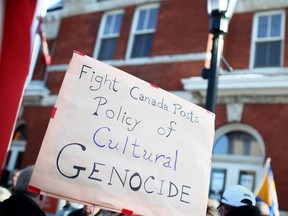 A protest sign outside the Sandwich post office, to protest the closing of the branch, made the crowd's feelings very clear, Saturday, Jan. 26, 2013.  (DAX MELMER/The Windsor Star)