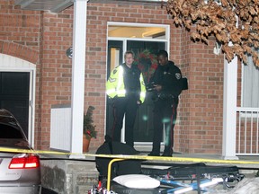 Ottawa police at the scene of reported double murder/ suicide at 25 Granite Ridge Dr. in Stittsville (Ottawa) on January 14, 2013. A single mother and her two school-aged children are apparently dead. More to come. (Mike Carroccetto / Ottawa Citizen)