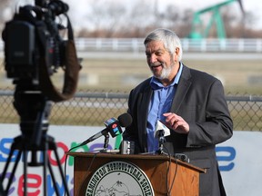 Warden Tom Bain speaks to a group area horsemen and supporters and political leaders during an announcement for the application to run 10 racing cards at Leamington Fair Grounds track.  January 17, 2013. (NICK BRANCACCIO/The Windsor Star)