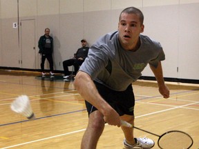 Aaron Henry of St. Clair College returns a shot against Elden Da Silva at the St. Clair College Badminton Invitational Friday. (NICK BRANCACCIO/The Windsor Star)