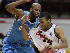Windsor's Darren Duncan, right, is guarded by Trayvon Lathan of Halifax at the WFCU Centre Friday. (DAN JANISSE/The Windsor Star)
