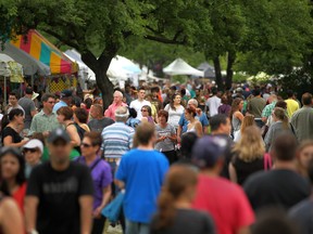 A large crowd  of people stroll through Willistead Park for Art in the Park, Sunday, June 3, 2012.   (DAX MELMER/The Windsor Star)