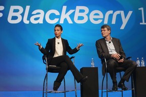 BlackBerry President and Chief Executive Officer Thorsten Heins (R) looks on as new BlackBerry Global Creative Director Alicia Keys speaks at the BlackBerry 10 launch event at Pier 36 in Manhattan on January 30, 2013 in New York City. The new smartphone and mobile operating system is being launched simultaneously in six cities. (Photo by Mario Tama/Getty Images)